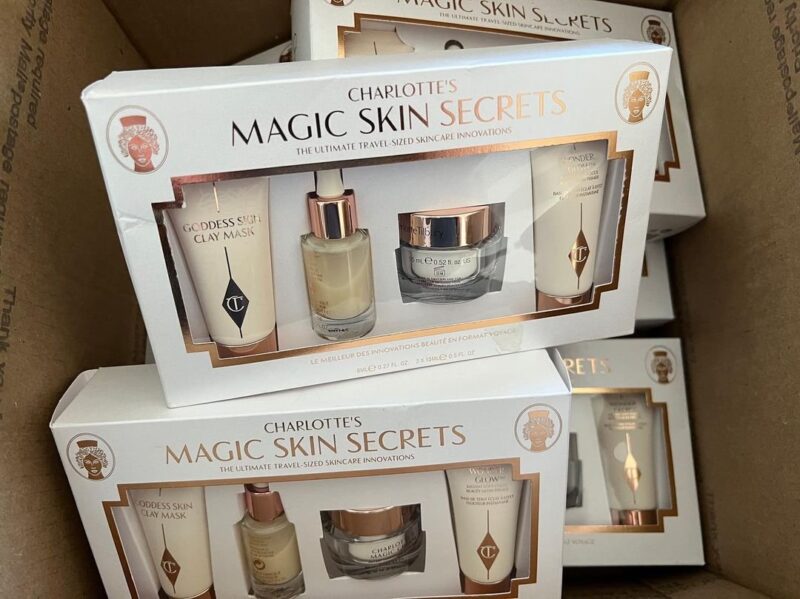 A bulk pallet of premium makeup products, including eyeshadows, lipsticks, and foundations from top brands like MAC, NARS, and Urban Decay. High End Brands Makeup Pallet for sale